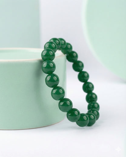 Attract luck and prosperity with this Natural Green Jade beaded bracelet. Handcrafted with premium 8mm green gemstones for harmony and abundance.